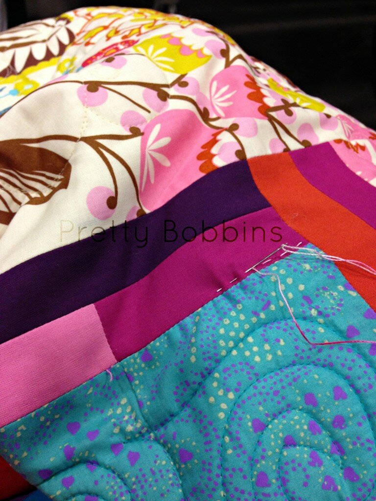 Of course taking a queen size quilt to handquilt at a guild meeting is the best idea in summer!