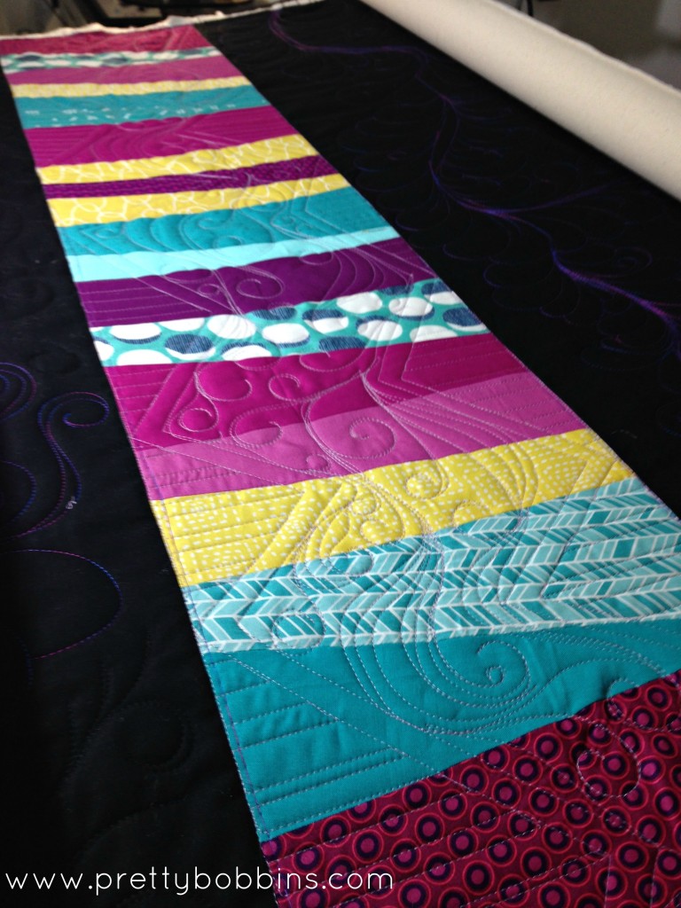 Pushing myself to grow as a quilter. Ruler work isn't easy and I enjoy the challenge of not marking my quilts.